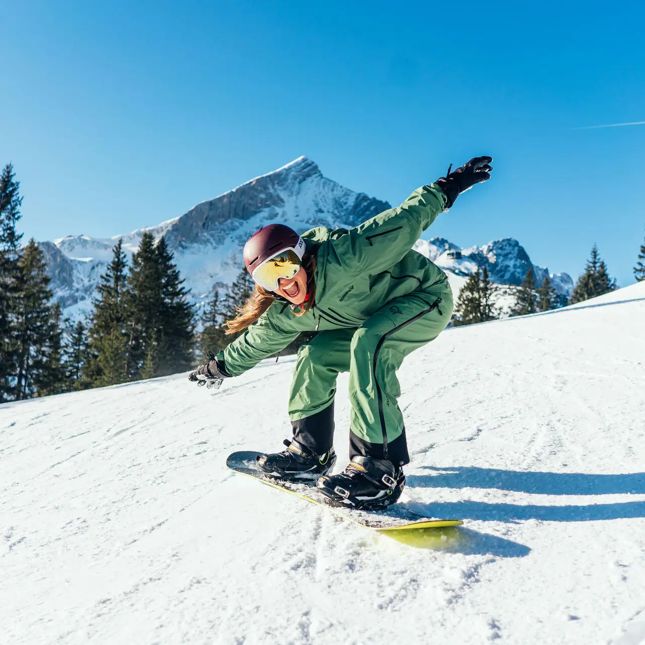 Snowboard Person on a snowboard outdoors.