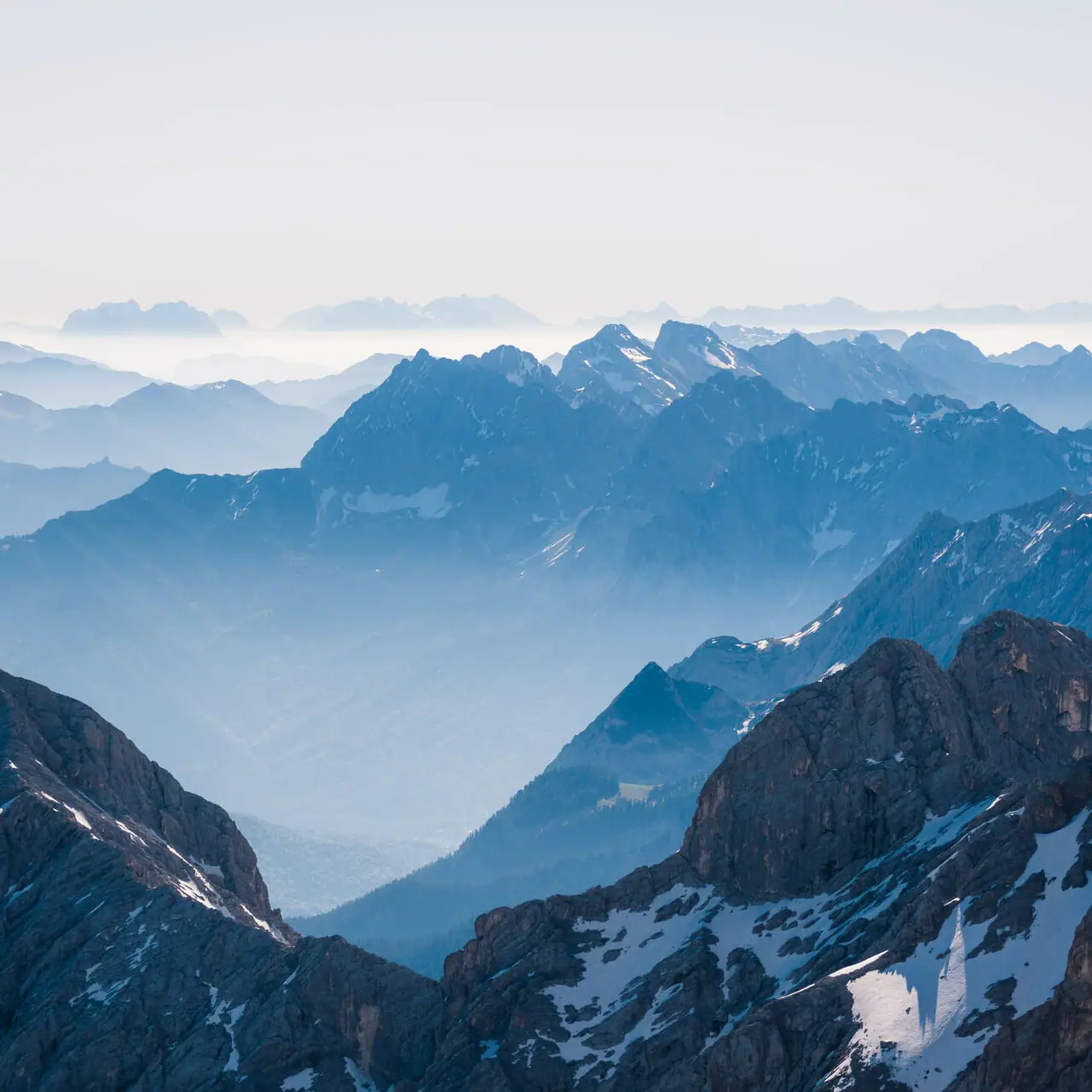 Zugspitze view Snow-covered mountain range outdoors.