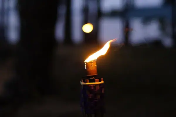 Fakel Torch with flame in the dark.