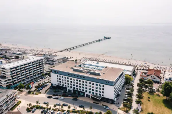 A building next to a beach.