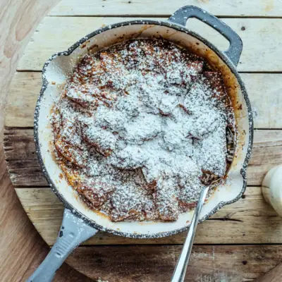Pot with food and icing sugar