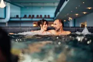 A man and a woman in a whirlpool.