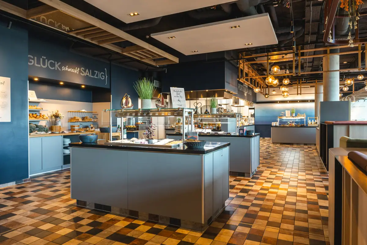 A restaurant with a chequered floor.