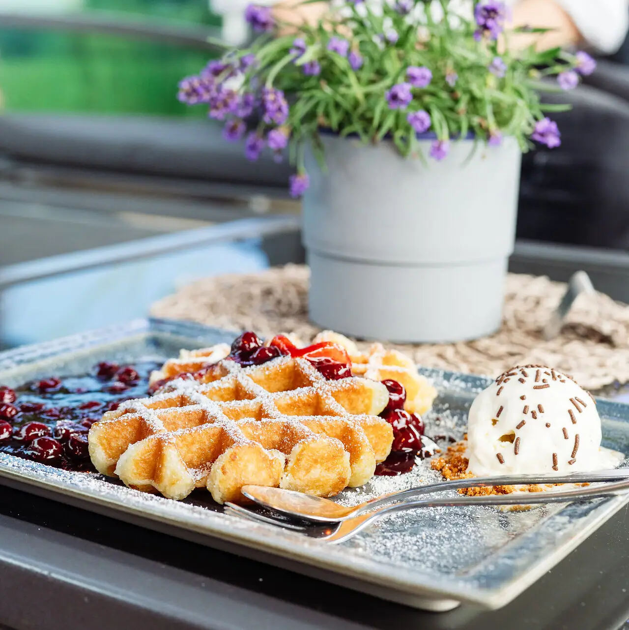 Waffles A plate of waffles and ice cream.