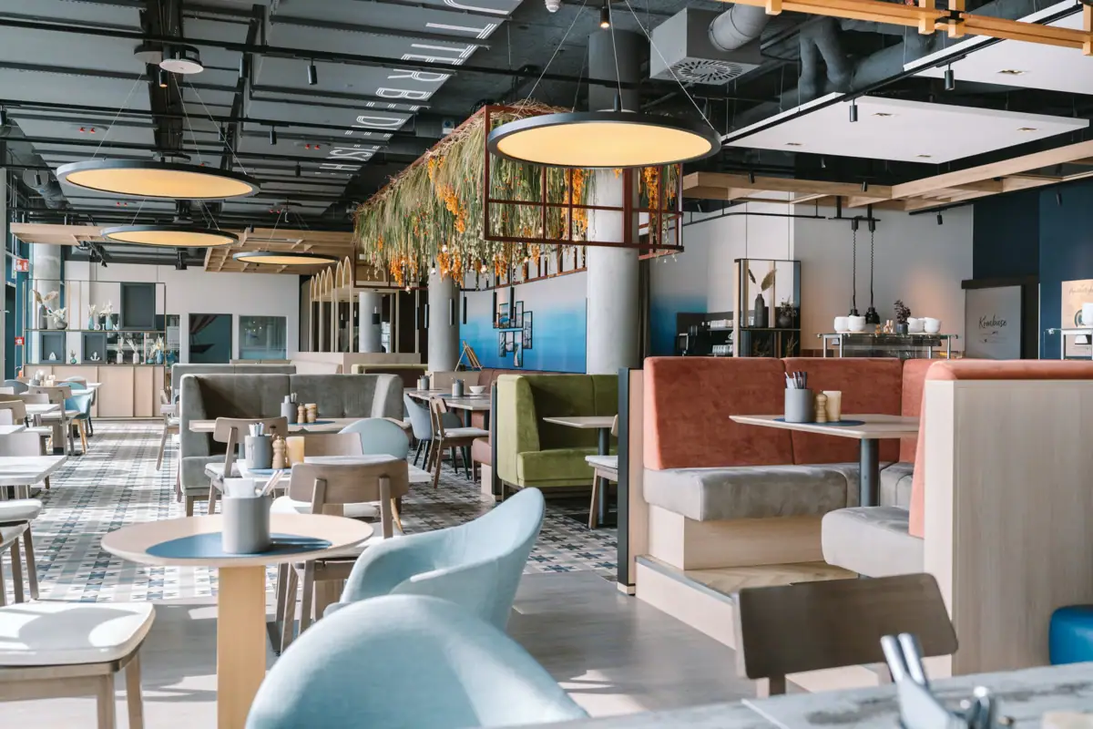 A restaurant with tables and chairs.