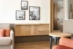 Junior Suite Mountain View A room with a table and chairs.