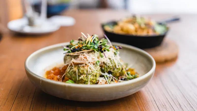 A bowl of food on a table