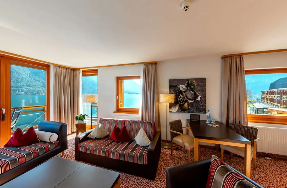 Suite with a view of Lake Achensee A room with sofas and armchairs.