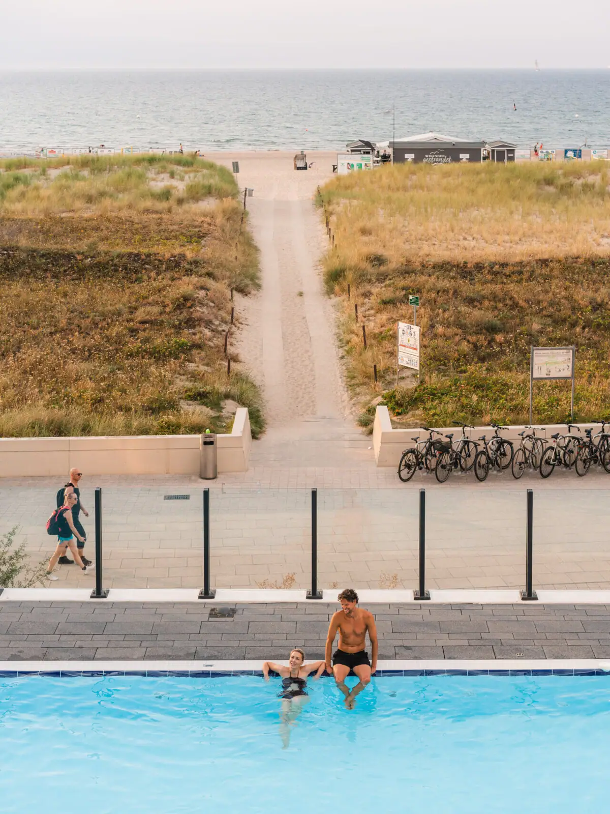 A group of people in a swimming pool.