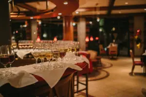 A group of wine glasses on a table.