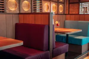 A table and chairs in a restaurant.