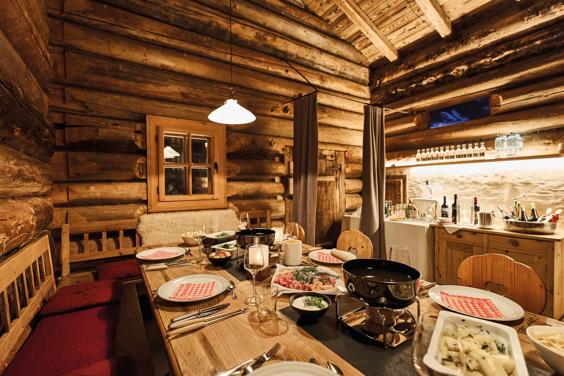 Moss mill A table with food in a log cabin.