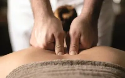 Person receives a back massage.