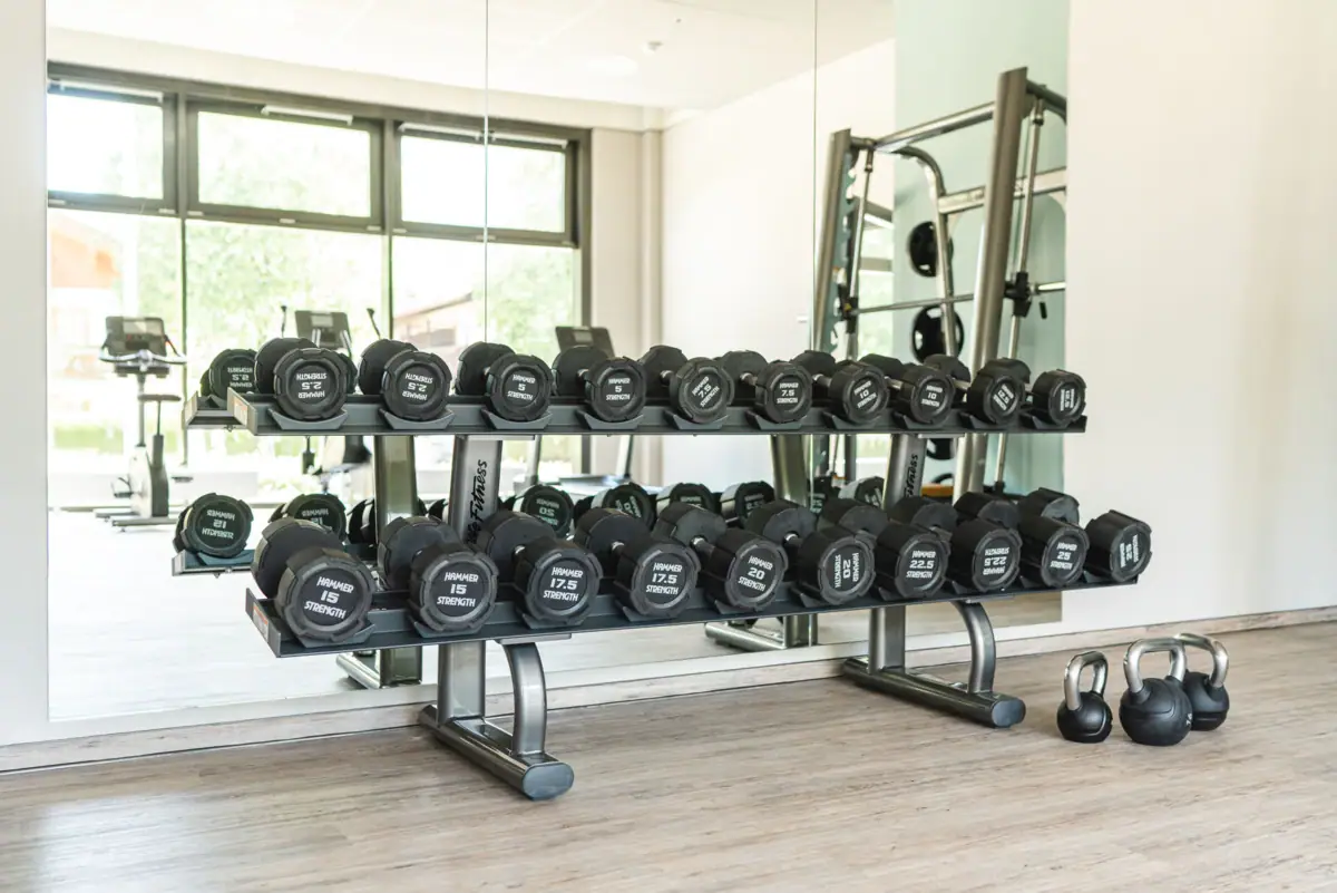 Fitness room A rack with weights in a fitness studio.