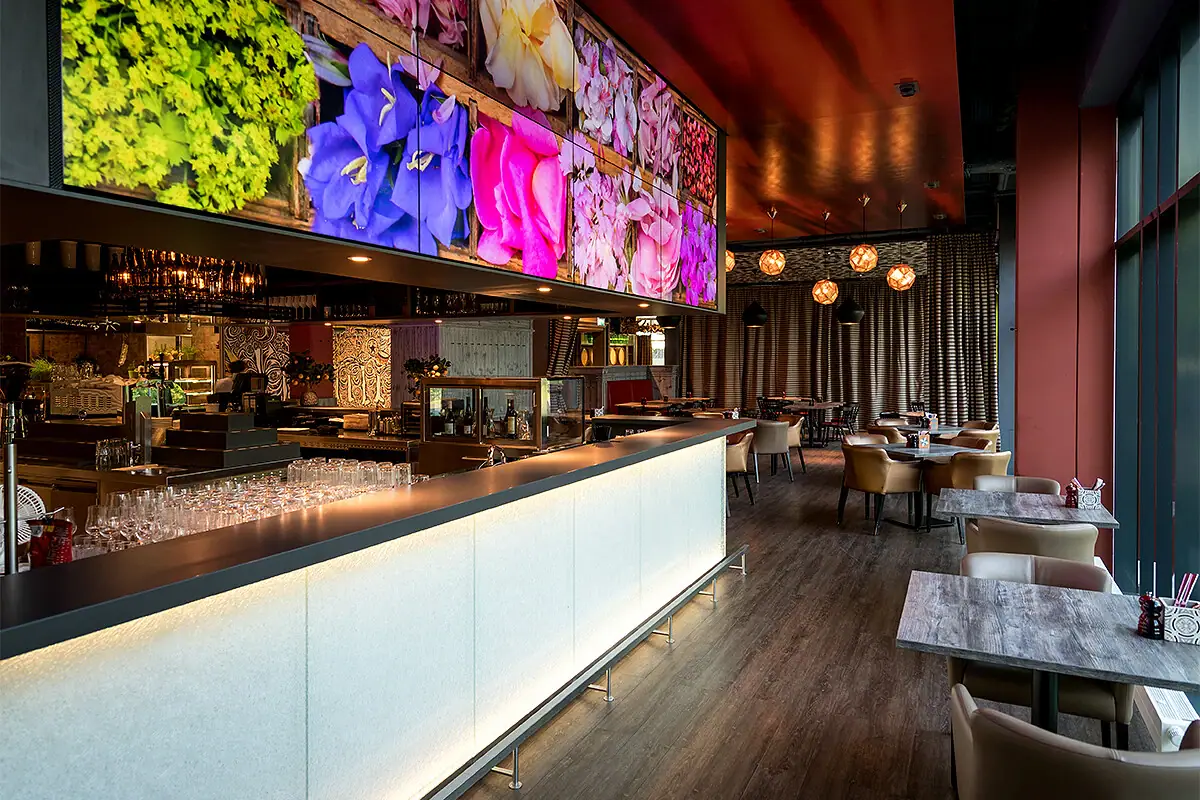 Area for dog owners Large screen with flowers on the wall.