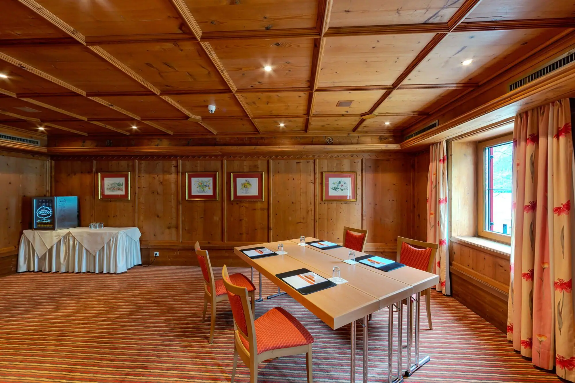 Meeting room with one table and four chairs.