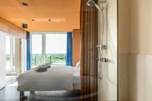 Shower in a room with modern interior design.