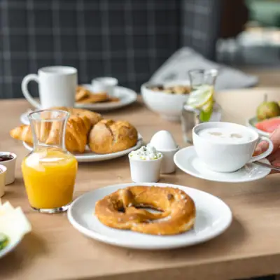 Breakfast A table with various dishes and drinks.
