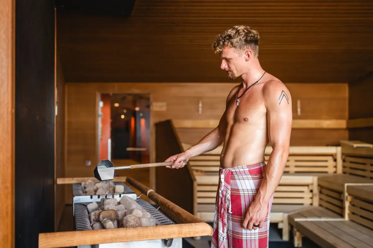 A man in red and white chequered shorts.