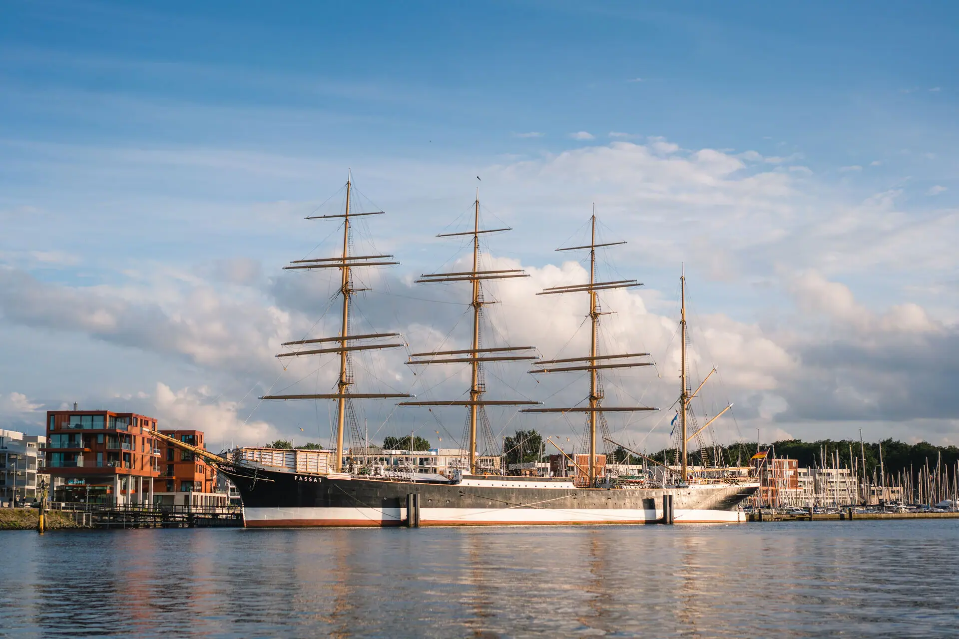 A large ship in the harbour.