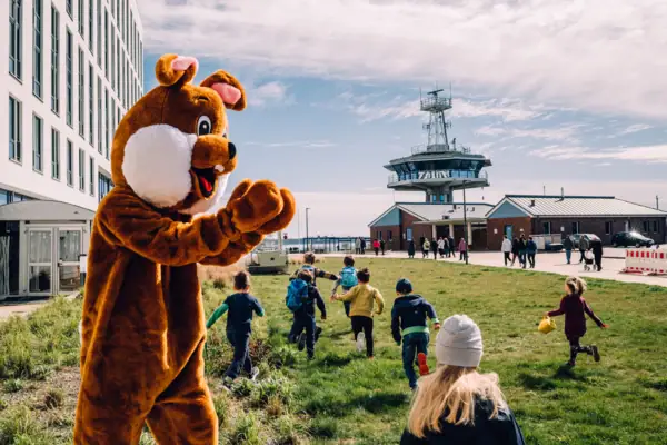 A person in a piece of clothing outdoors.