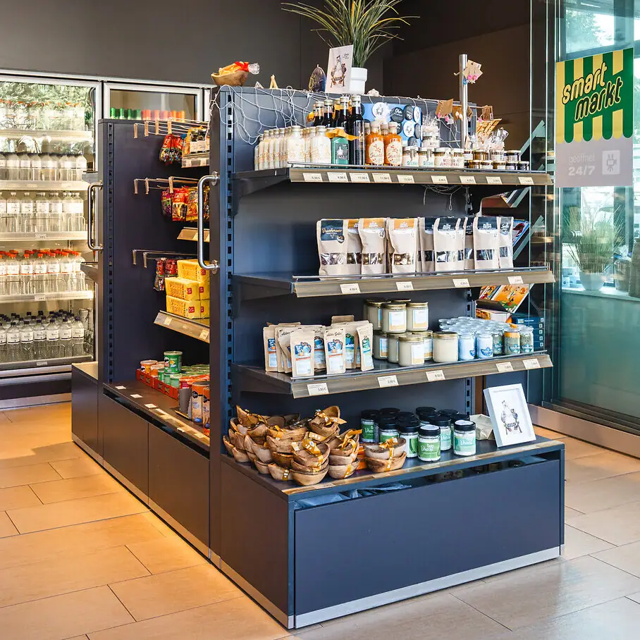 A shop with shelves full of food and drinks.