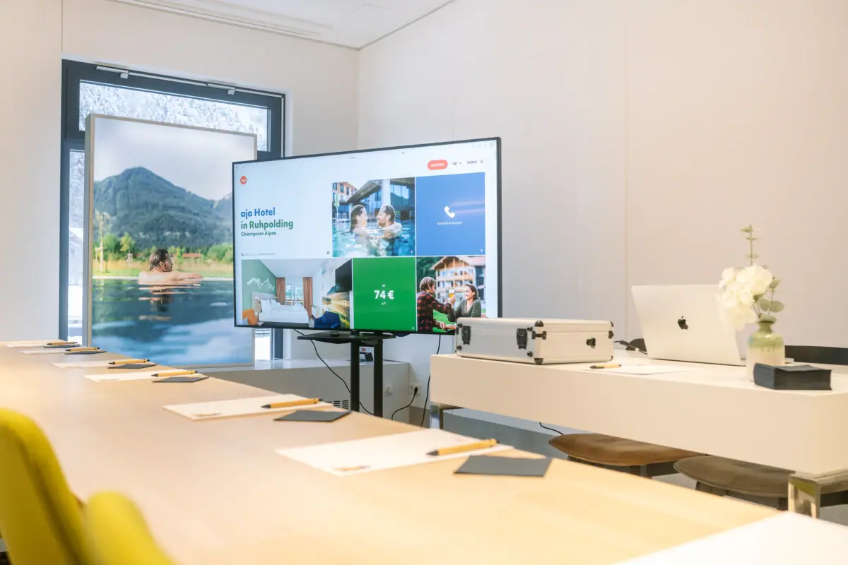 A room with a large screen.