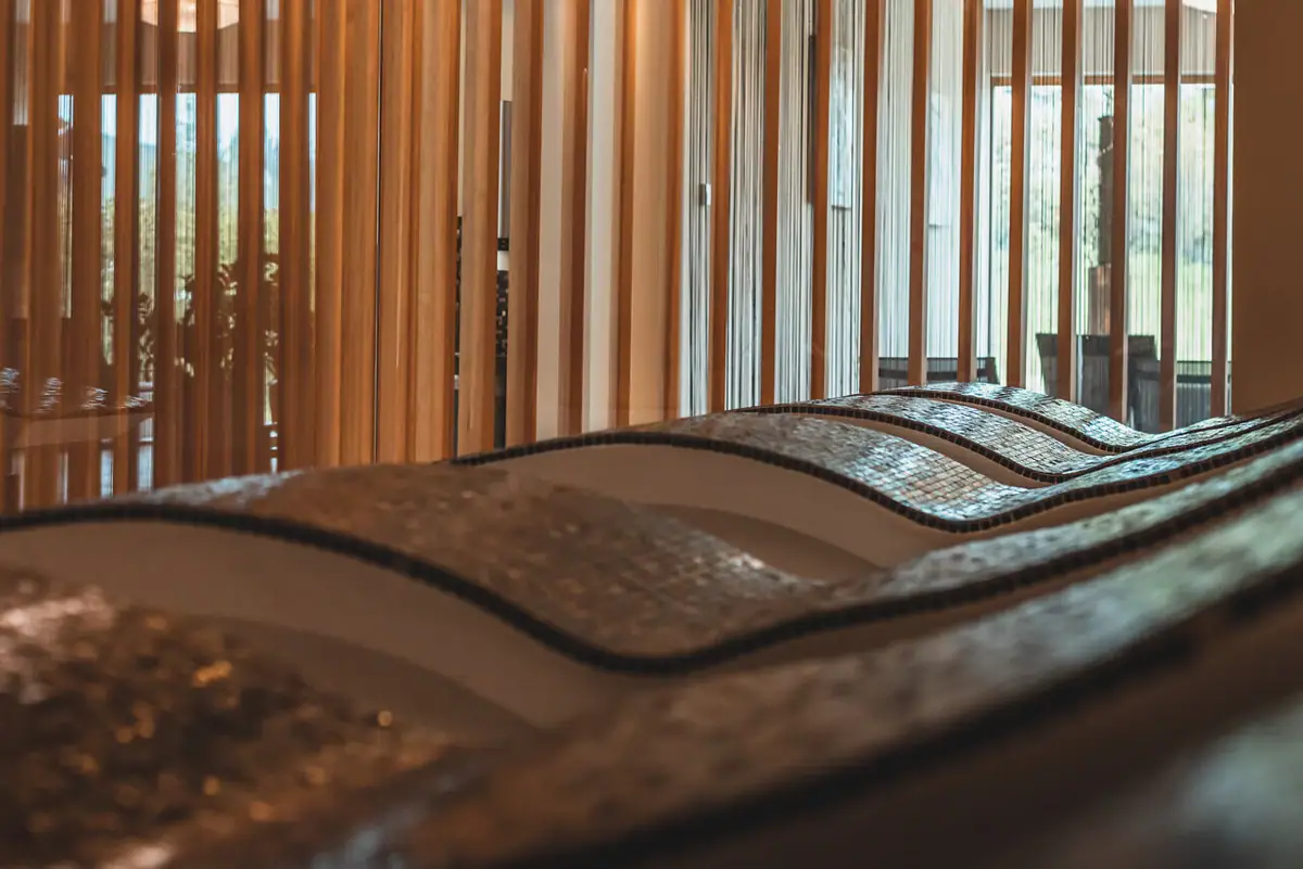 Various stone loungers in a separate area