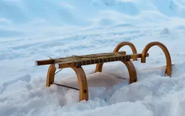 Wooden sledges in the snow