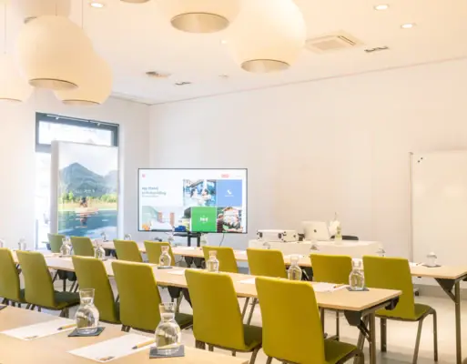 A room with tables and chairs.