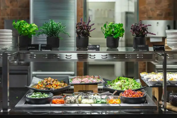 Food on a shelf in a kitchen.