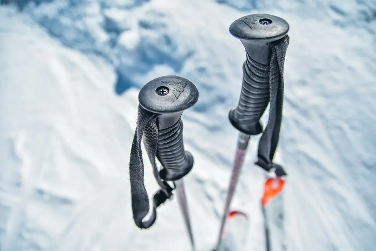 A pair of ski poles in the snow