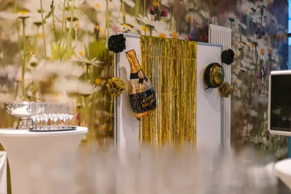 Champagne bottle and golden streamers