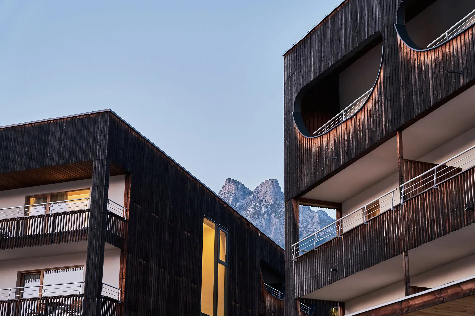aja Bergresort Werfenweng The hotel building with balconies and the mountains in the background