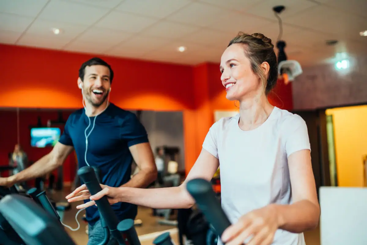 Cardio area A man and a woman in a fitness studio.