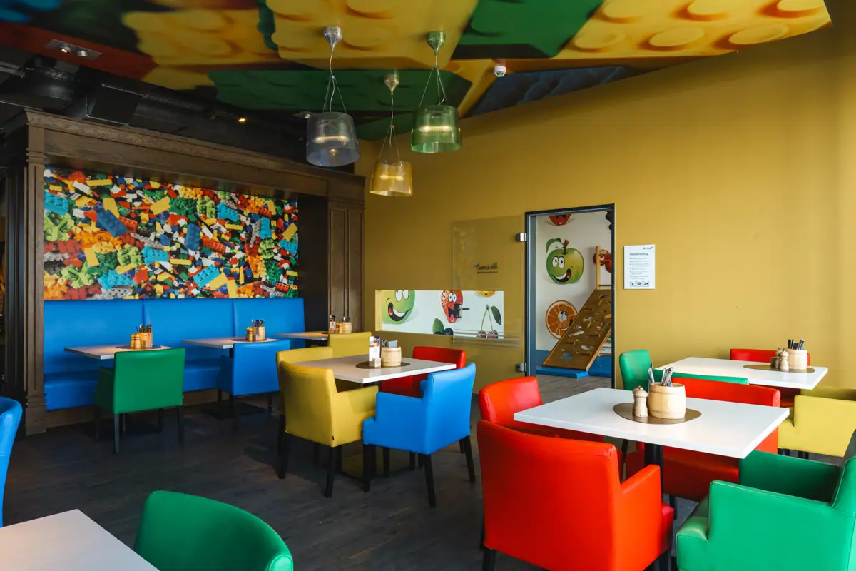 Colourful tables and chairs in a restaurant.