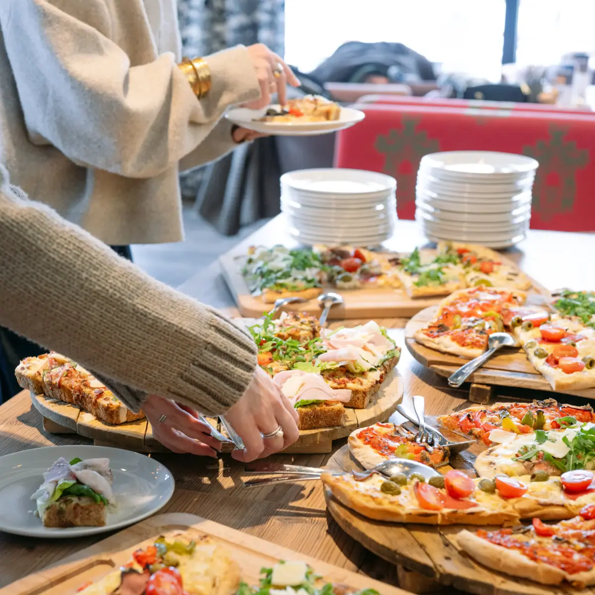 A group of people serving food.