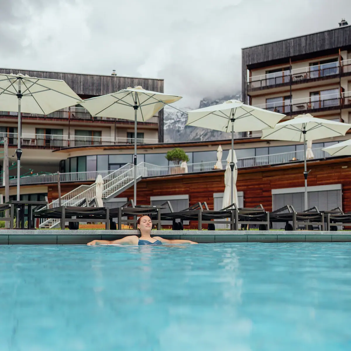 A woman in a swimming pool.