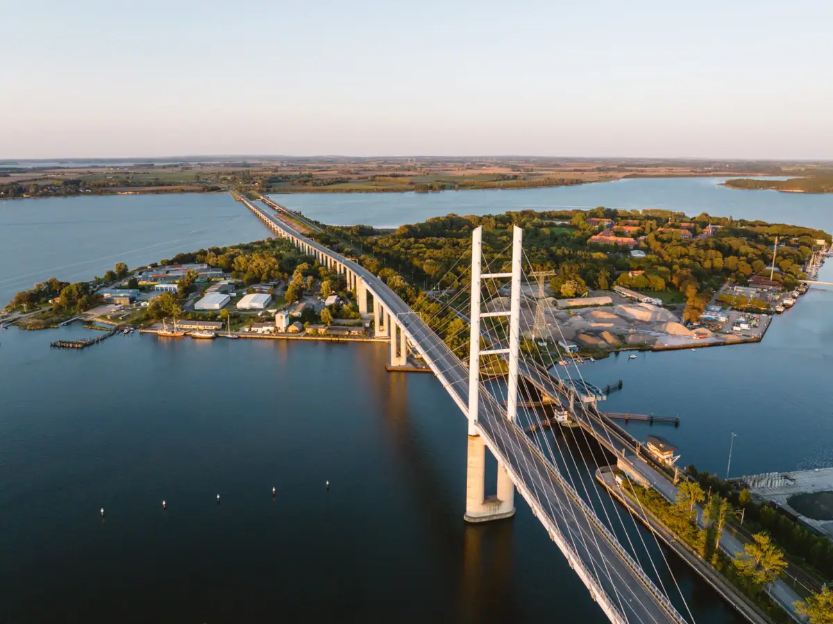 Rügen Bridge Bridge over water with city in the background
