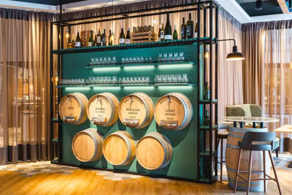 Wine barrels A room with wine barrels and glasses.