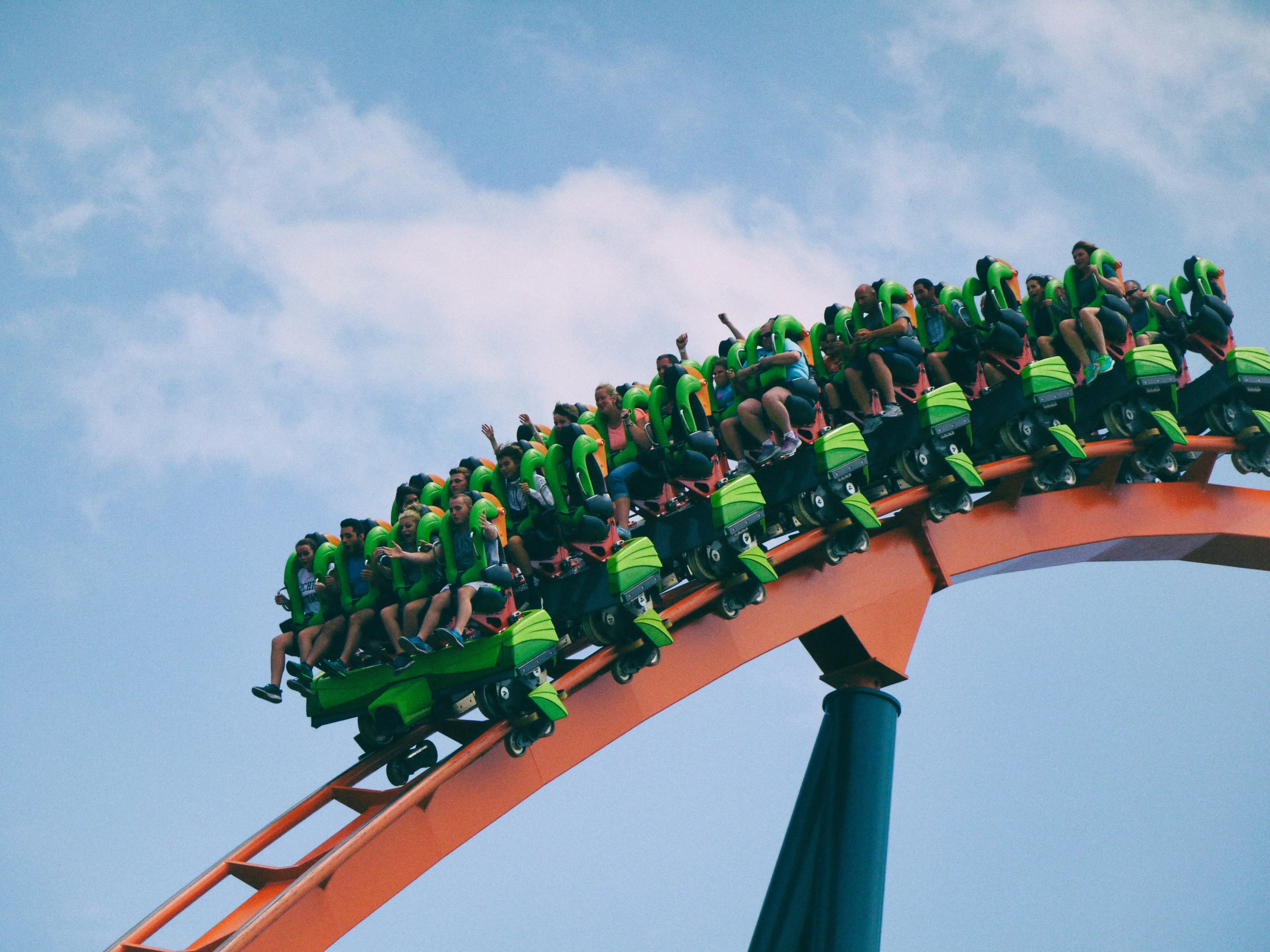 A group of people on a rollercoaster.