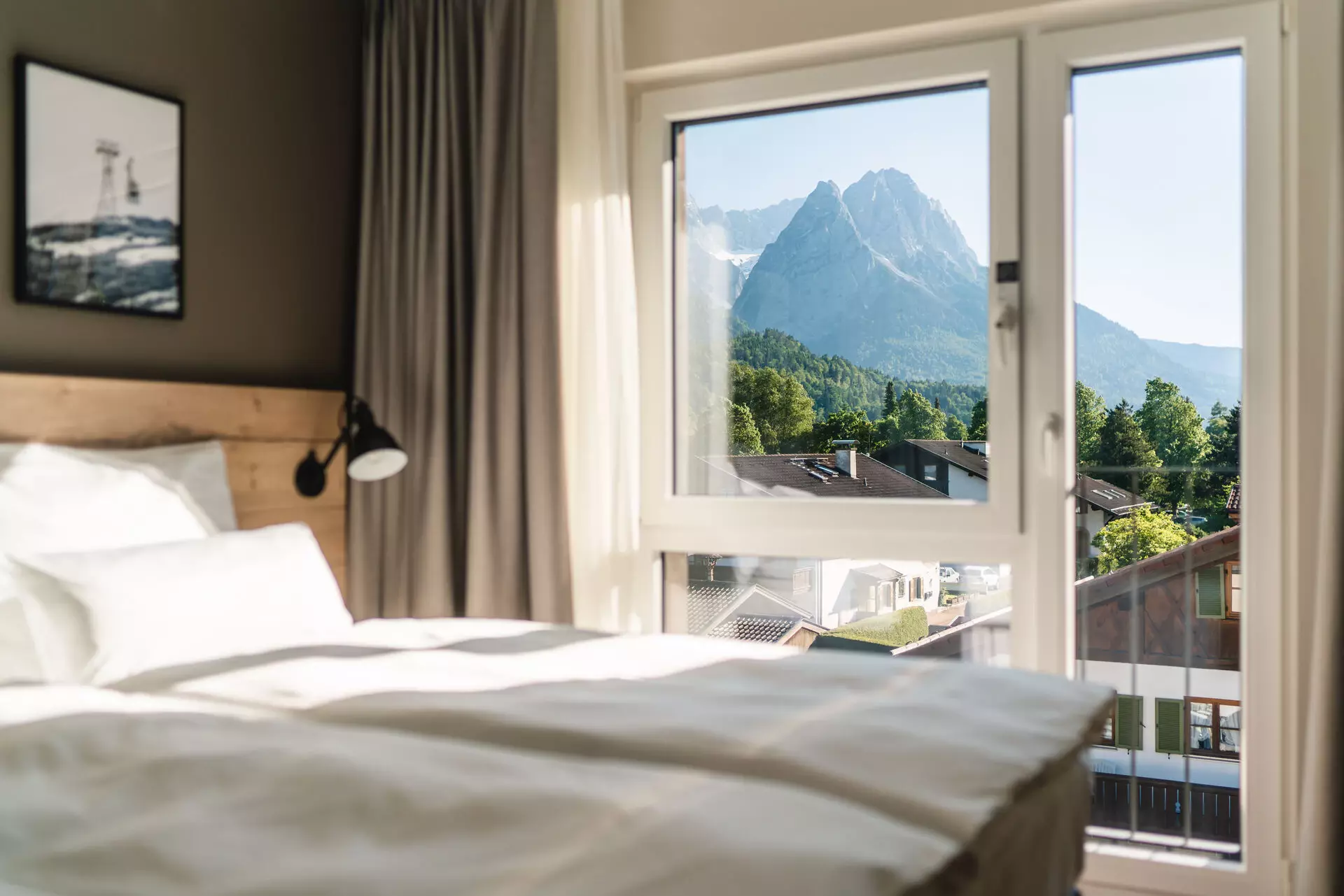 Bedroom with window and view of the mountains