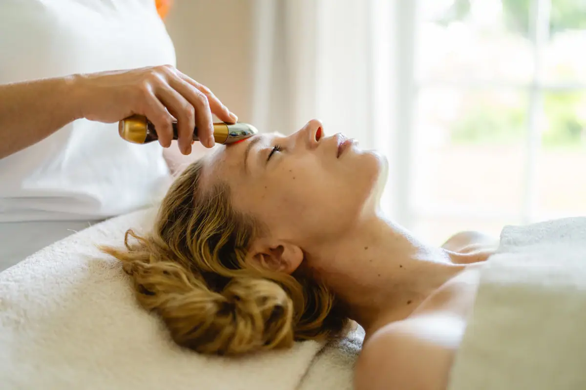 aja SPA applications A woman receives a facial massage.