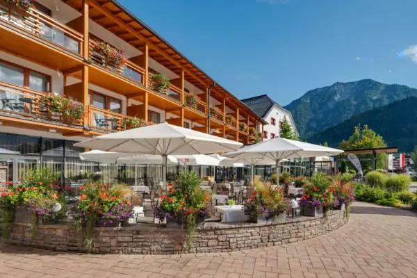 Terrace A building with a terrace and parasols.