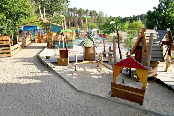 A playground with colourful play equipment.
