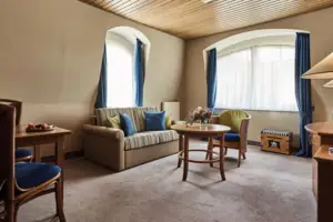 Living room with couch and table.