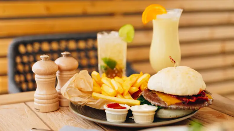 A plate of fast food on a table.