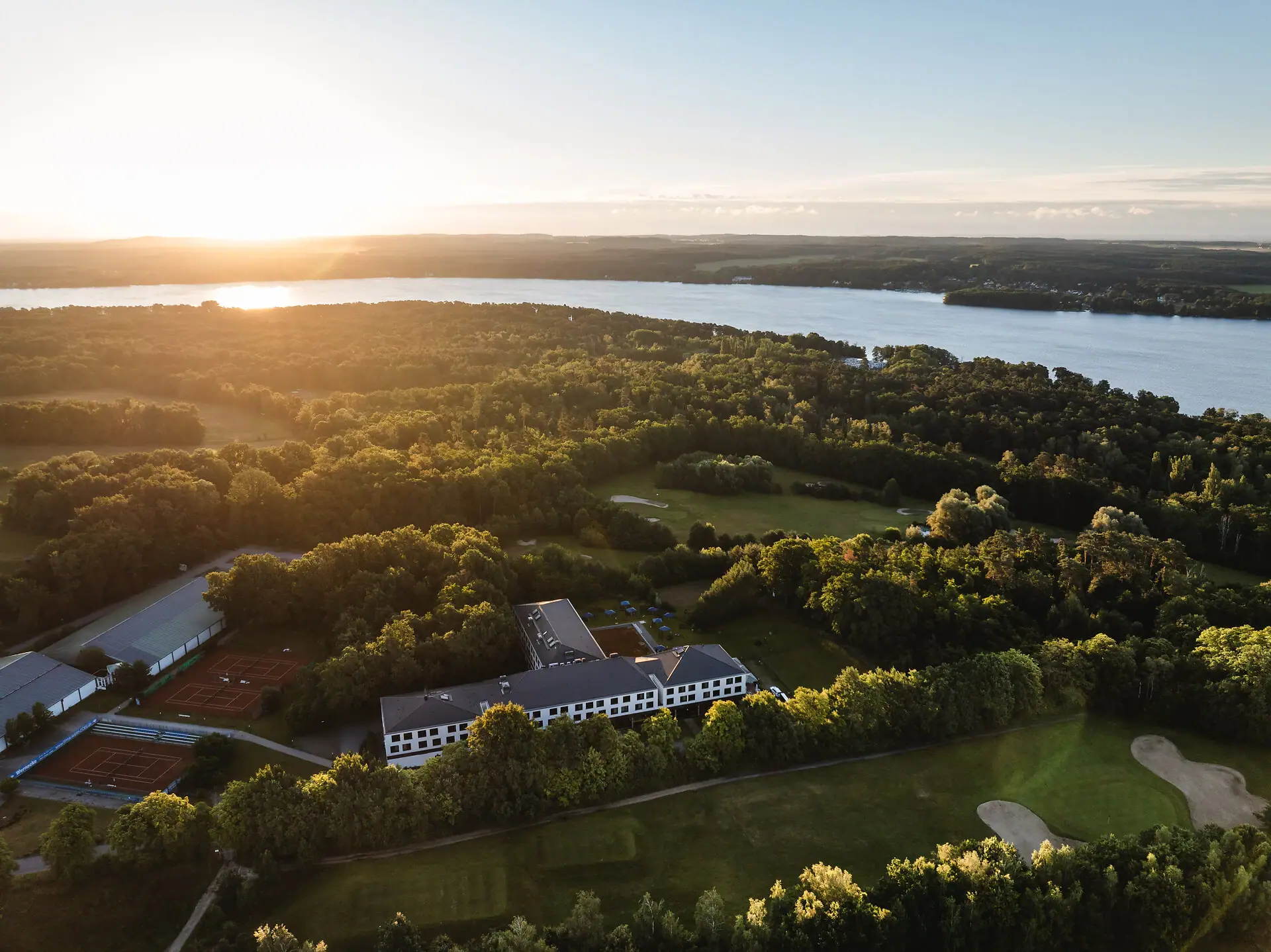 aja Bad Saarow Large body of water with a building and trees in the foreground.