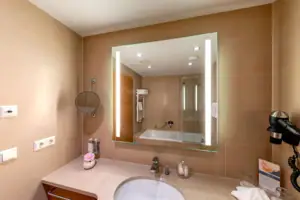 Bathroom Bathroom with mirror and washbasin.