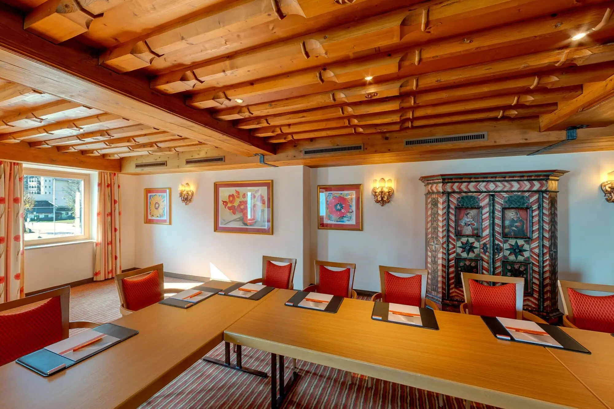 Meeting room with tables and chairs.